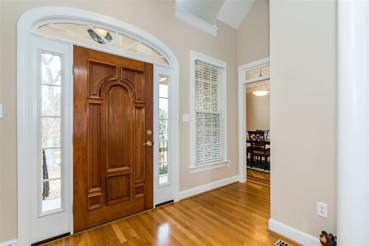 107 Austin Pond Road Clayton, NC 27520 - Photo 2 of 24 Transoms and hardwoods set off this entry! Gorgeous entry foyer
