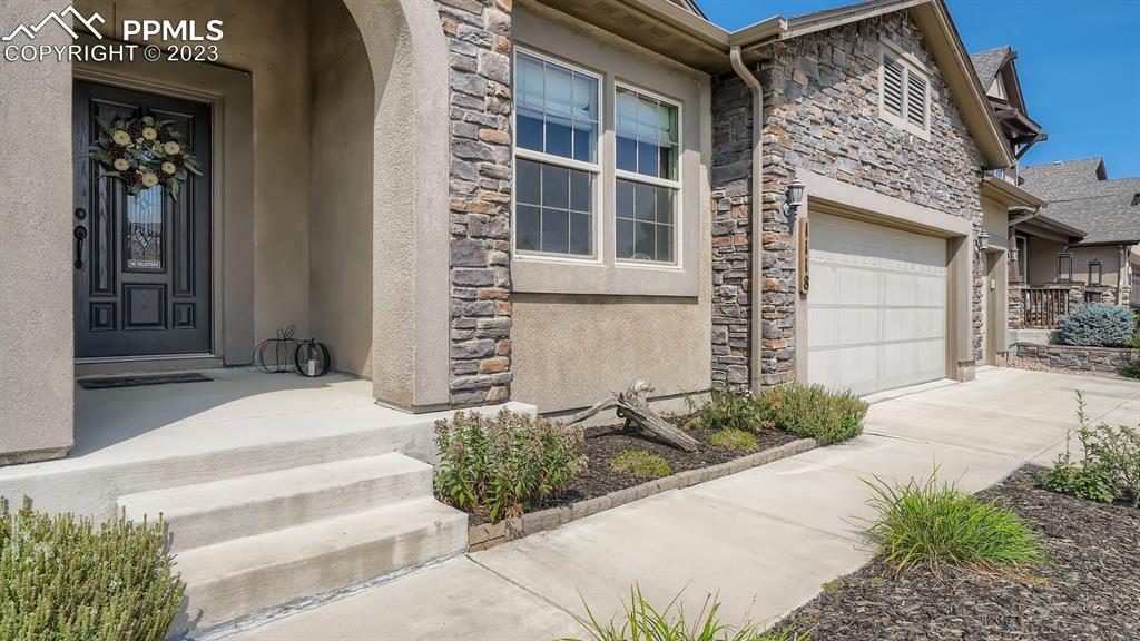 1118 Spectrum Loop Colorado Springs, CO 80921 - Photo 2 of 30 a front view of a house