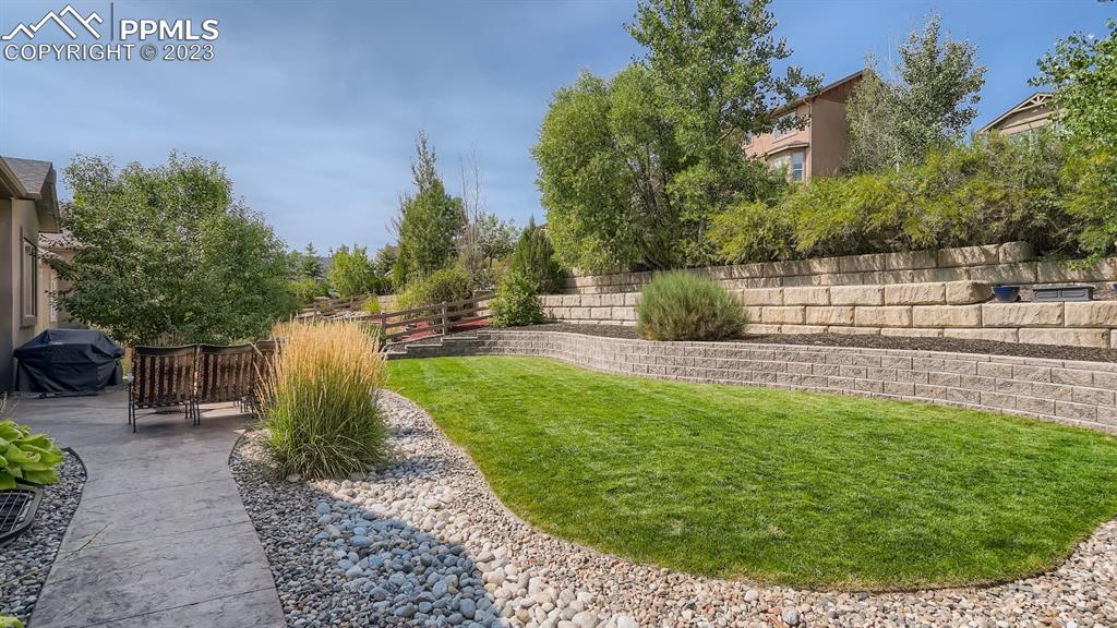 1118 Spectrum Loop Colorado Springs, CO 80921 - Photo 26 of 30 a view of a garden