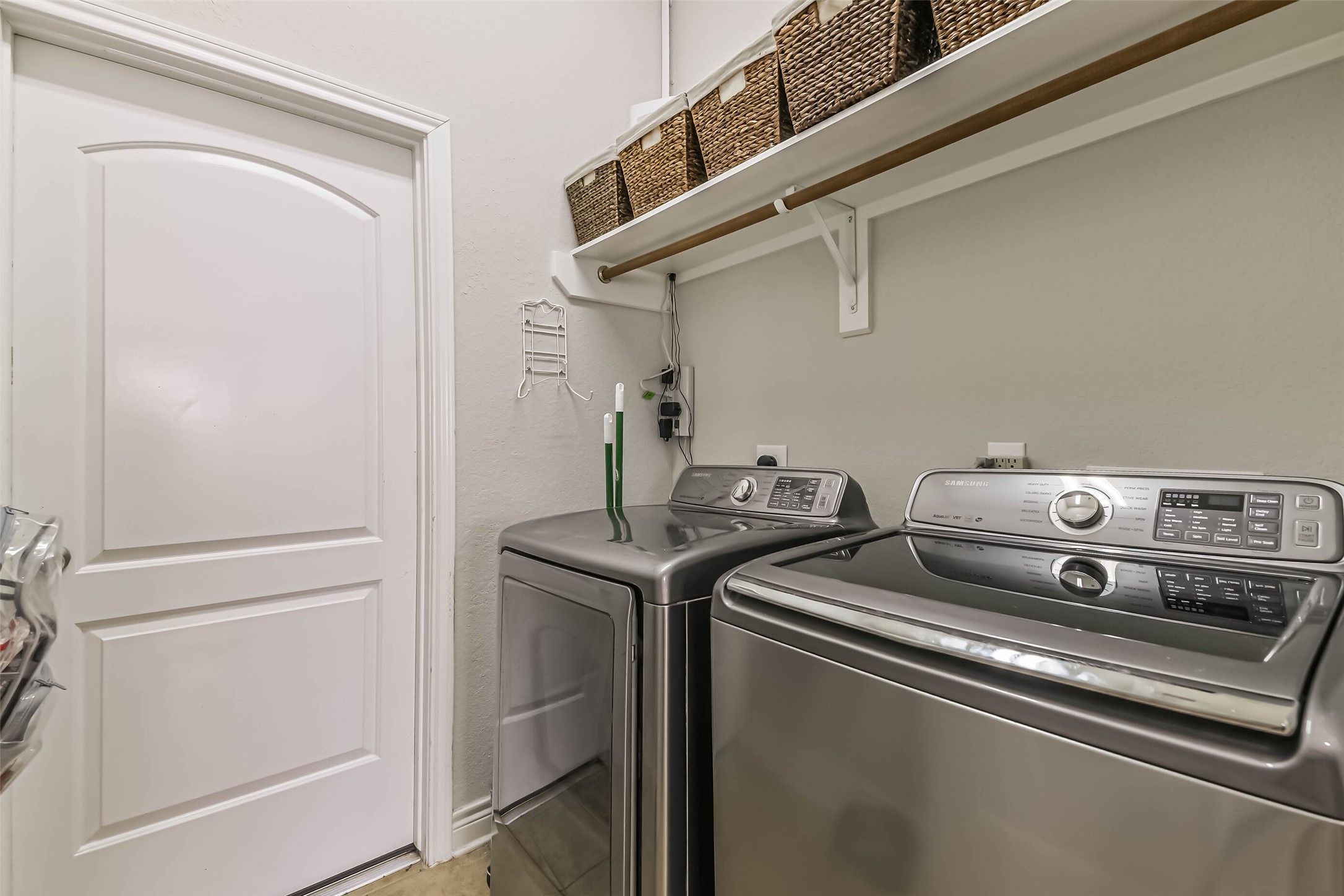 19022 Greenleaf Ridge Court Cypress, TX 77429 - Photo 21 of 47 a utility room with dryer and washer