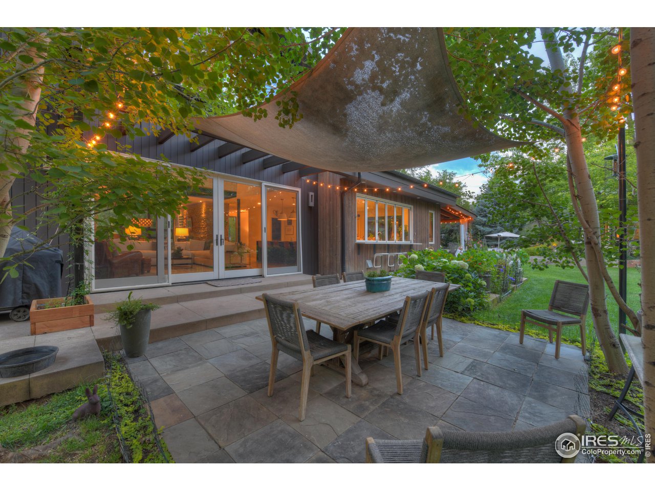 2115 Linden Avenue Boulder, CO 80304 - Photo 17 of 40 a backyard of a house with outdoor seating