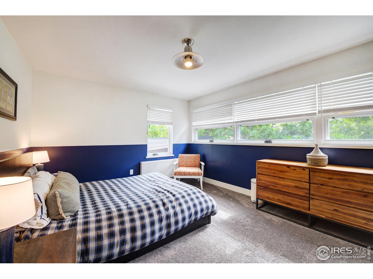 2115 Linden Avenue Boulder, CO 80304 - Photo 21 of 40 a bedroom with furniture and a window