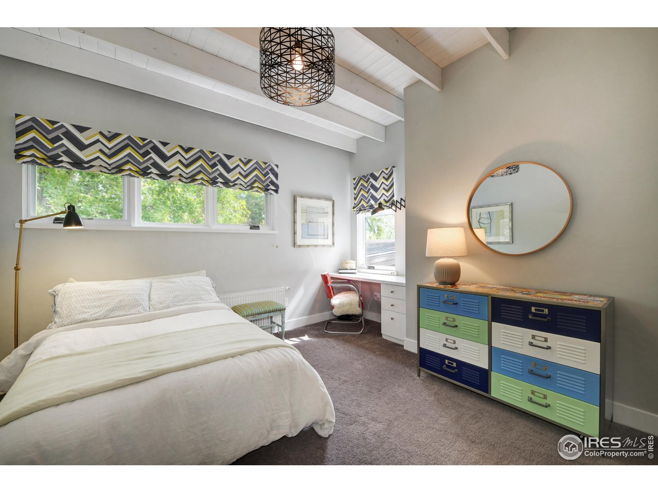 2115 Linden Avenue Boulder, CO 80304 - Photo 23 of 40 a bedroom with a bed window and a dresser