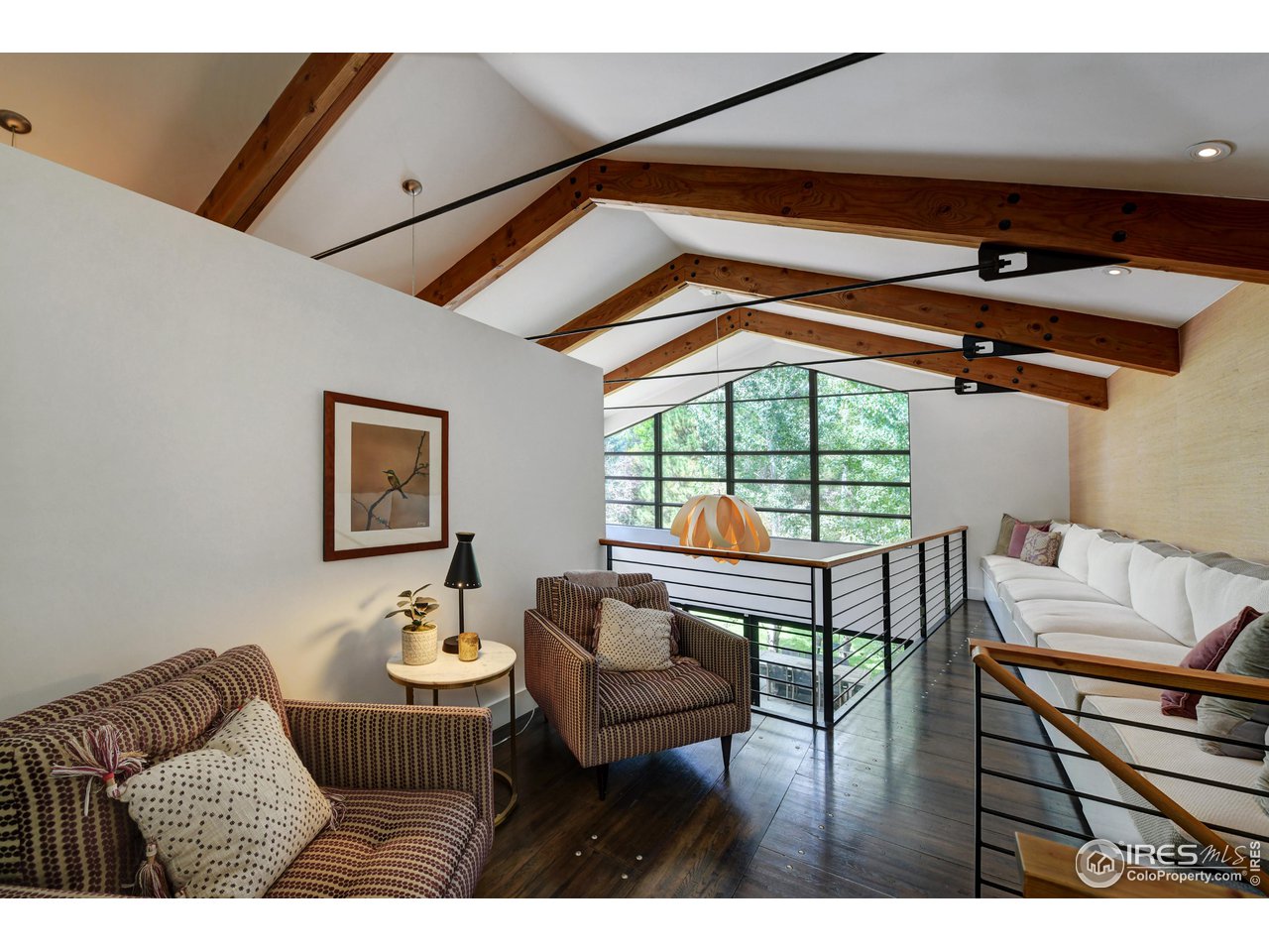 2115 Linden Avenue Boulder, CO 80304 - Photo 26 of 40 a living room with furniture and a window