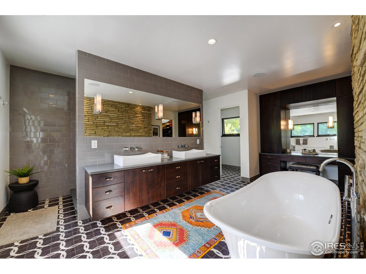 2115 Linden Avenue Boulder, CO 80304 - Photo 28 of 40 a living room with furniture a flat screen tv and a table