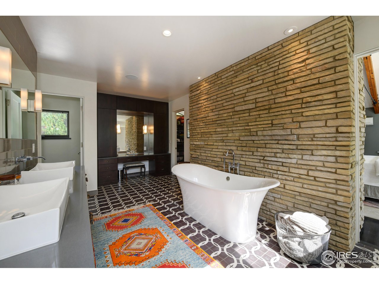 2115 Linden Avenue Boulder, CO 80304 - Photo 29 of 40 a bathroom with a toilet a sink and bathtub