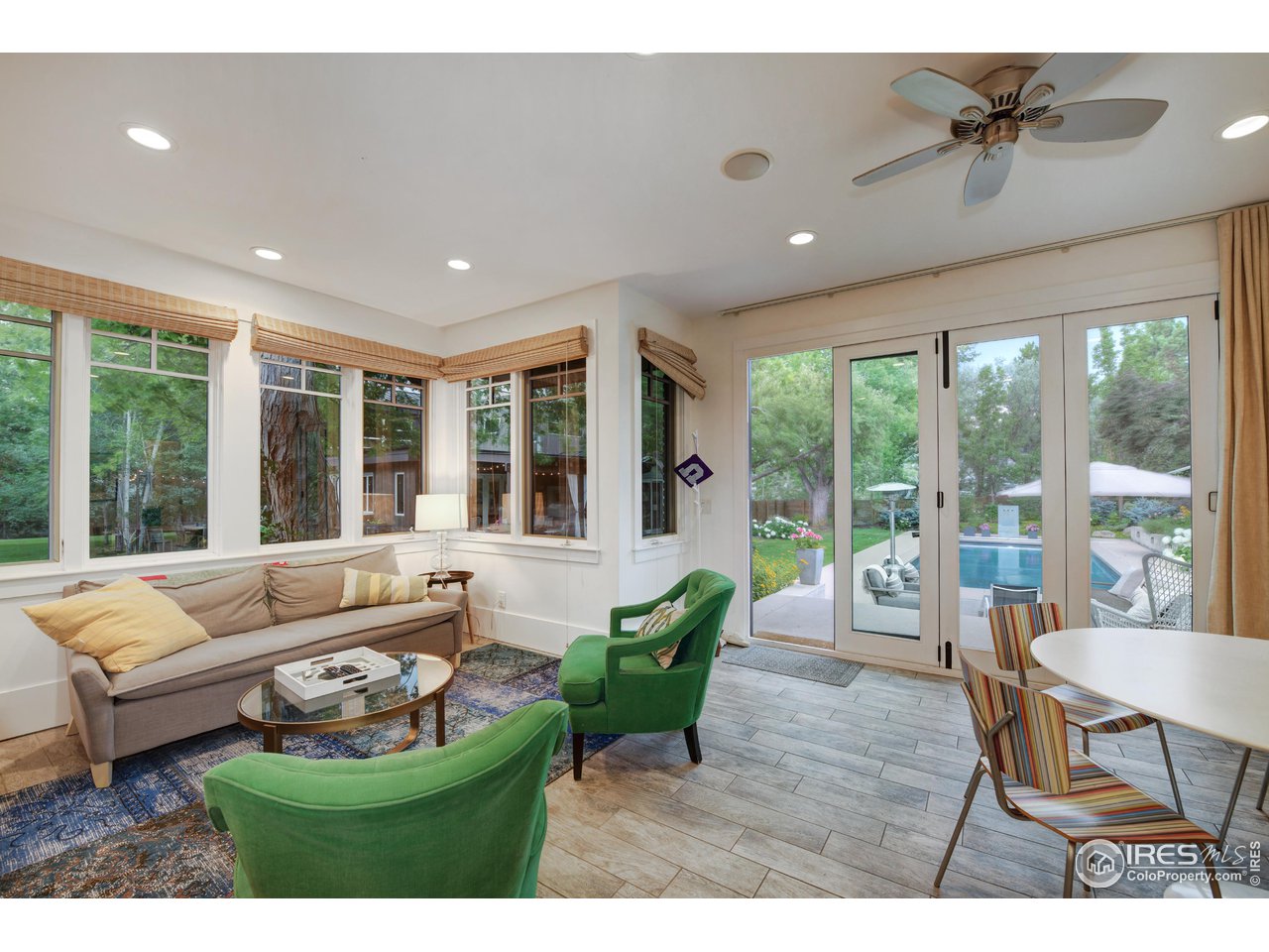 2115 Linden Avenue Boulder, CO 80304 - Photo 34 of 40 a living room with furniture and a large window