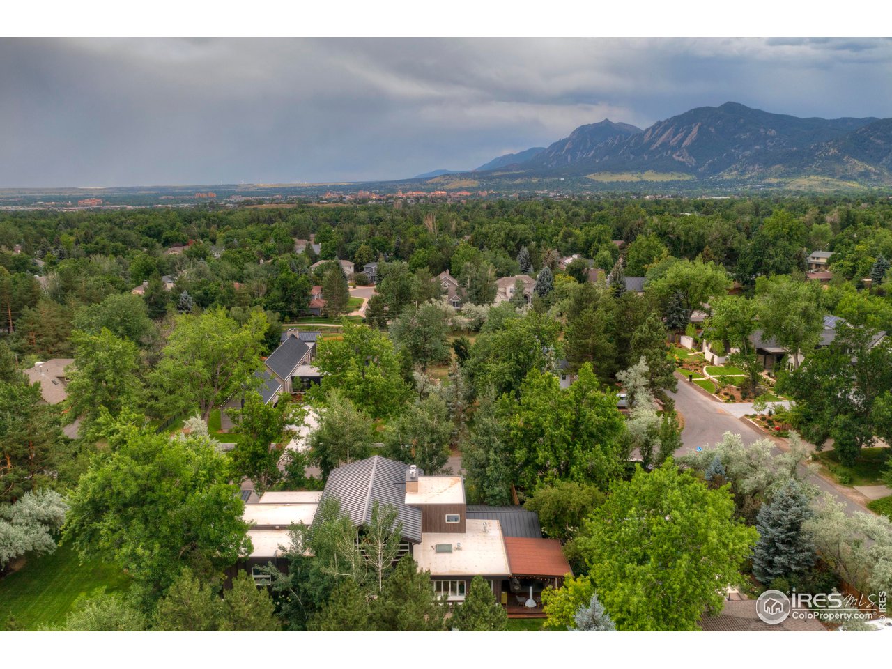 2115 Linden Avenue Boulder, CO 80304 - Photo 4 of 40 a view of a city with lush green forest