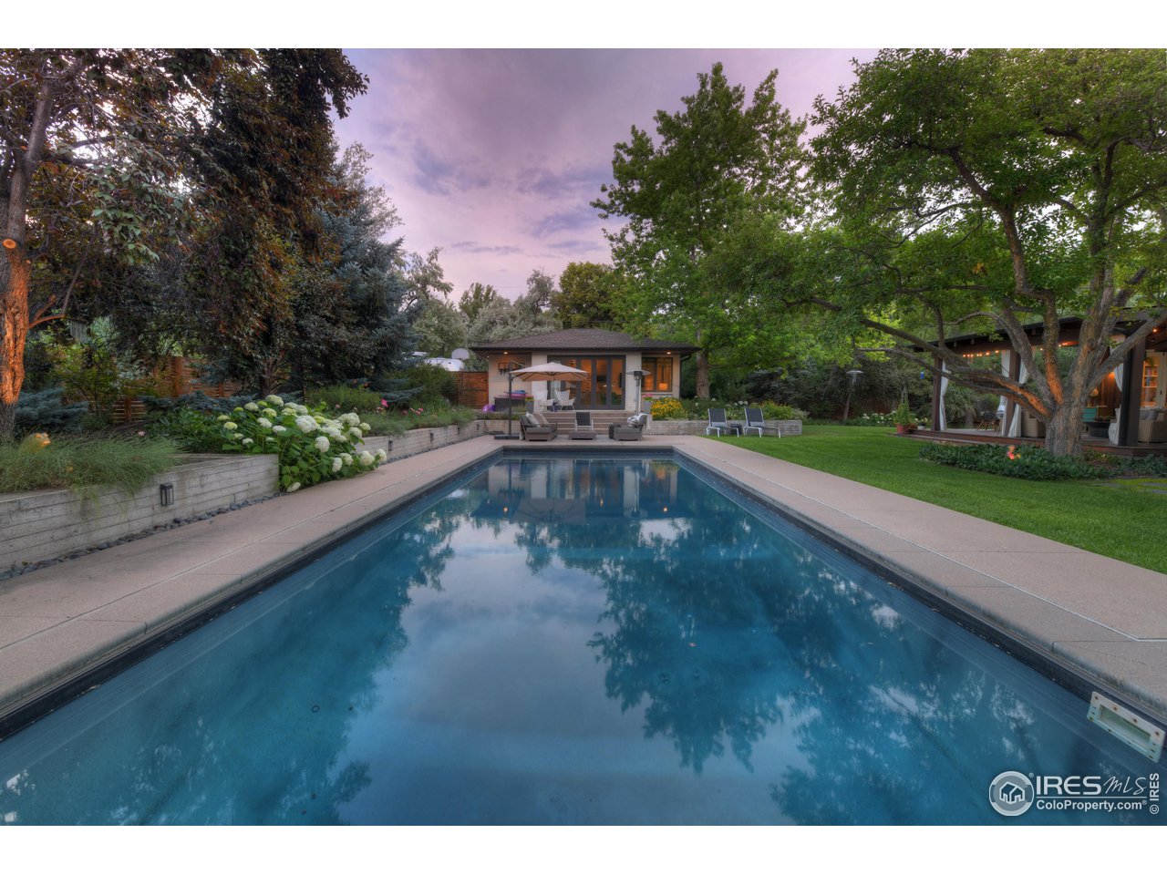 2115 Linden Avenue Boulder, CO 80304 - Photo 9 of 40 a view of a swimming pool with a yard