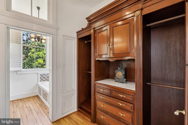 a bathroom with a bathtub and a sink