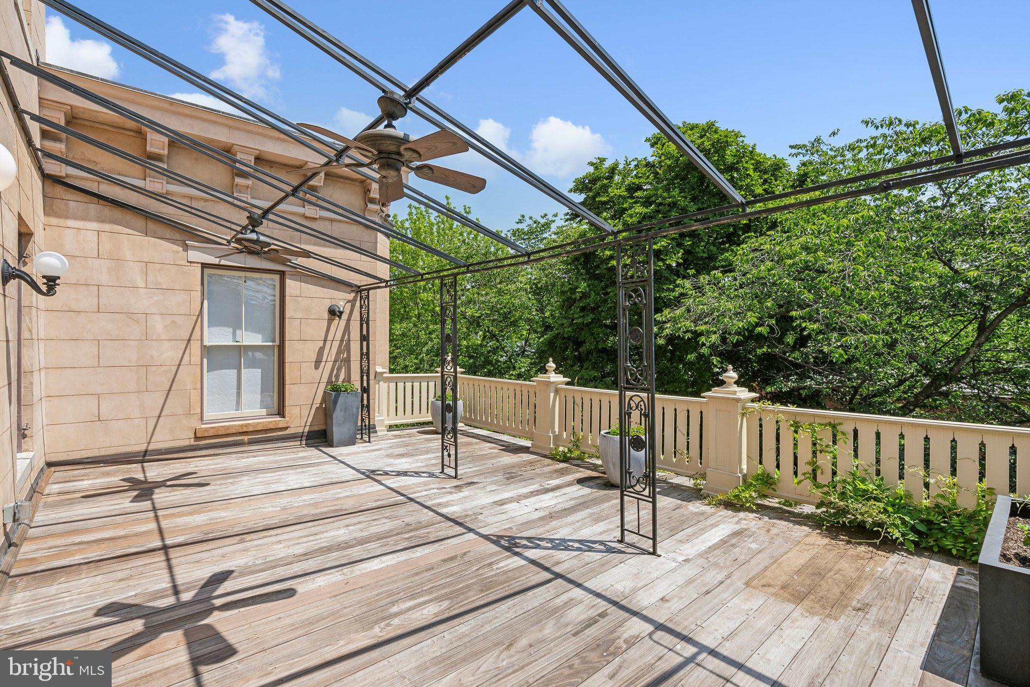 1527 35th Street Northwest Washington, DC 20007 - Photo 17 of 33 a view of a house with backyard and sitting area