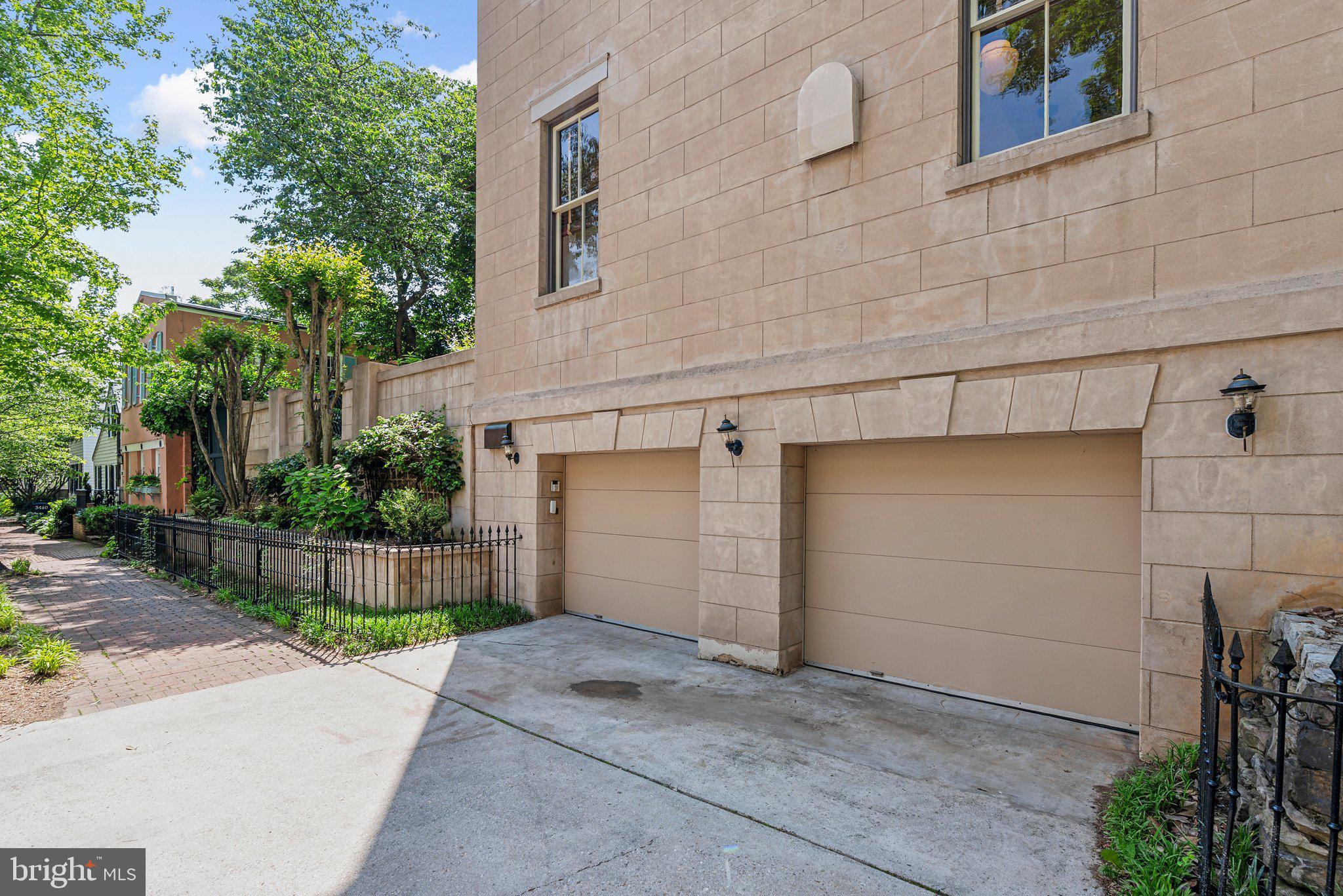 1527 35th Street Northwest Washington, DC 20007 - Photo 24 of 33 a front view of a house with a garage