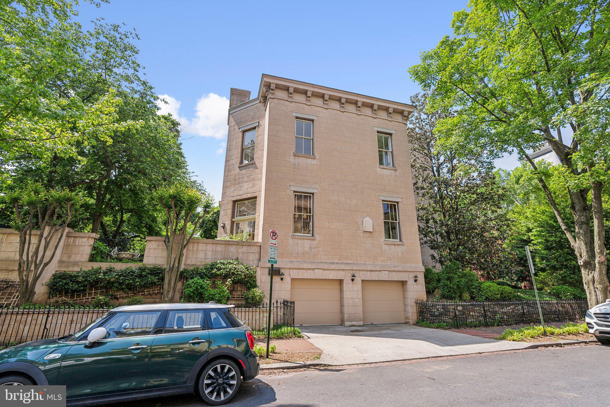 1527 35th Street Northwest Washington, DC 20007 - Photo 26 of 33 a front view of a house with parking