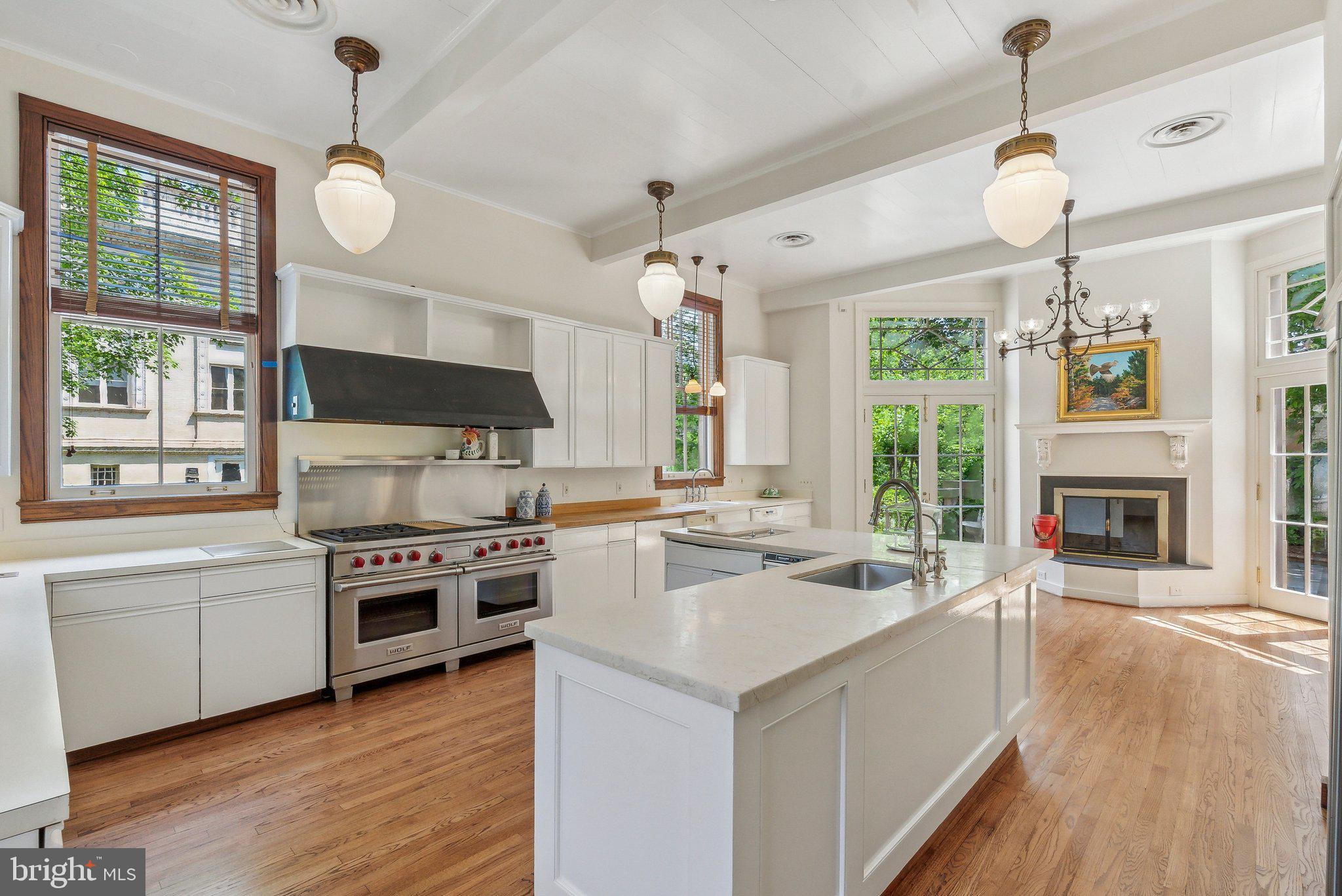 1527 35th Street Northwest Washington, DC 20007 - Photo 9 of 33 a kitchen with stove a sink and a refrigerator