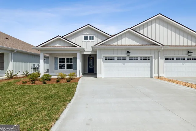 a front view of a house with entertaining space