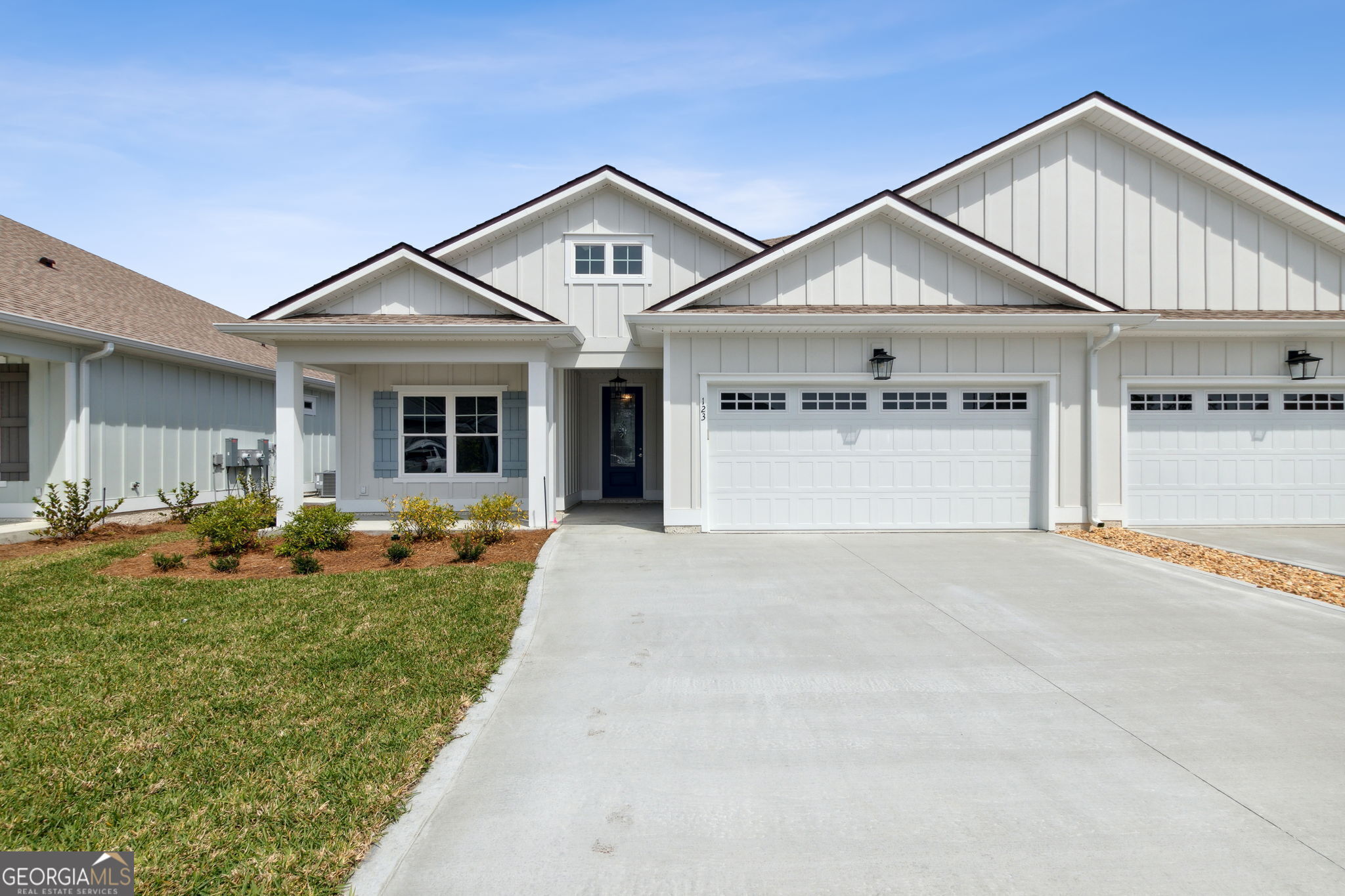 107 Green Turtle Court Kingsland, GA 31548 - Photo 1 of 39 a front view of a house with entertaining space