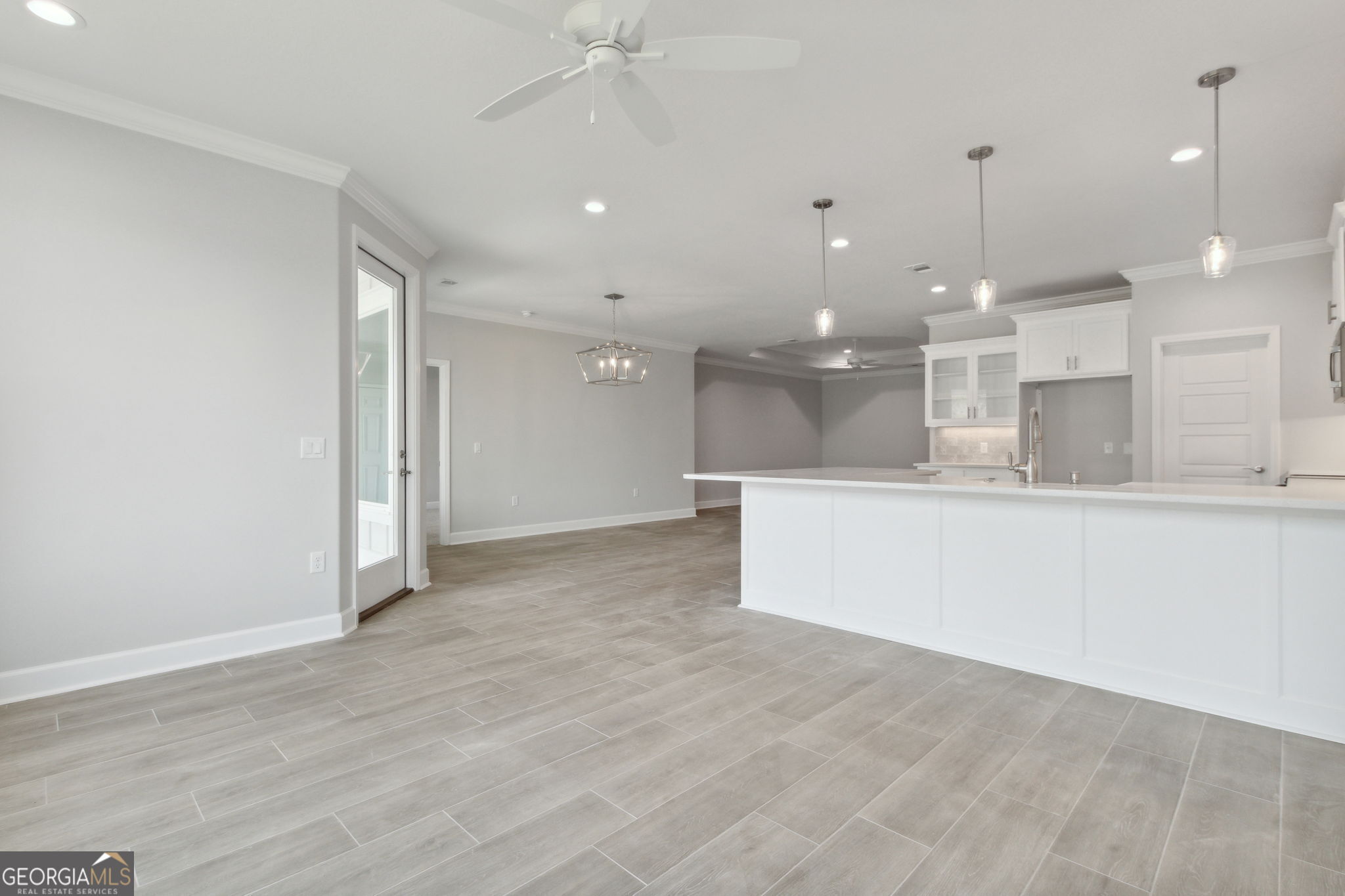 107 Green Turtle Court Kingsland, GA 31548 - Photo 18 of 39 a view of a kitchen with a sink and refrigerator