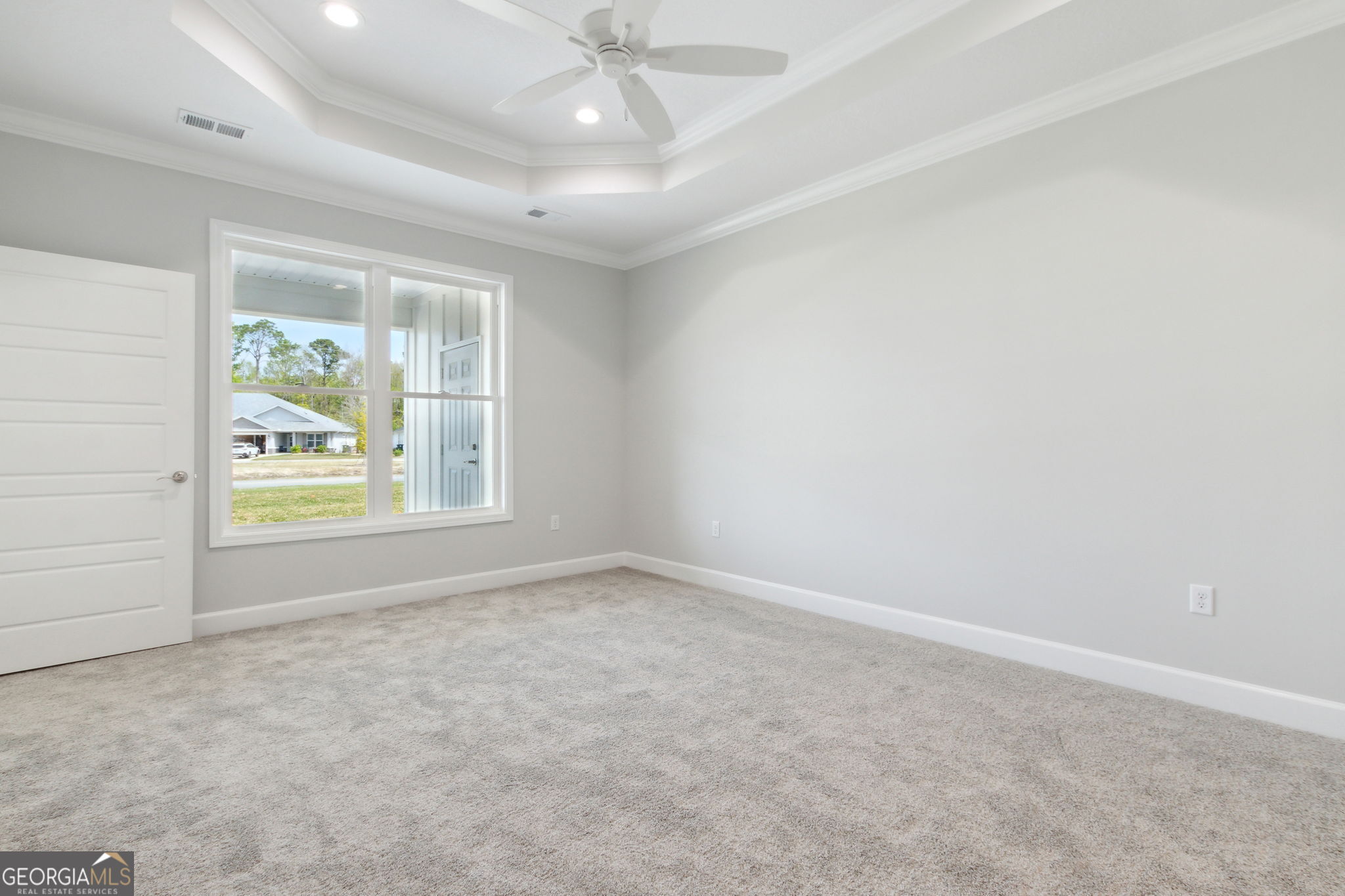 107 Green Turtle Court Kingsland, GA 31548 - Photo 20 of 39 an empty room with windows and outdoor view