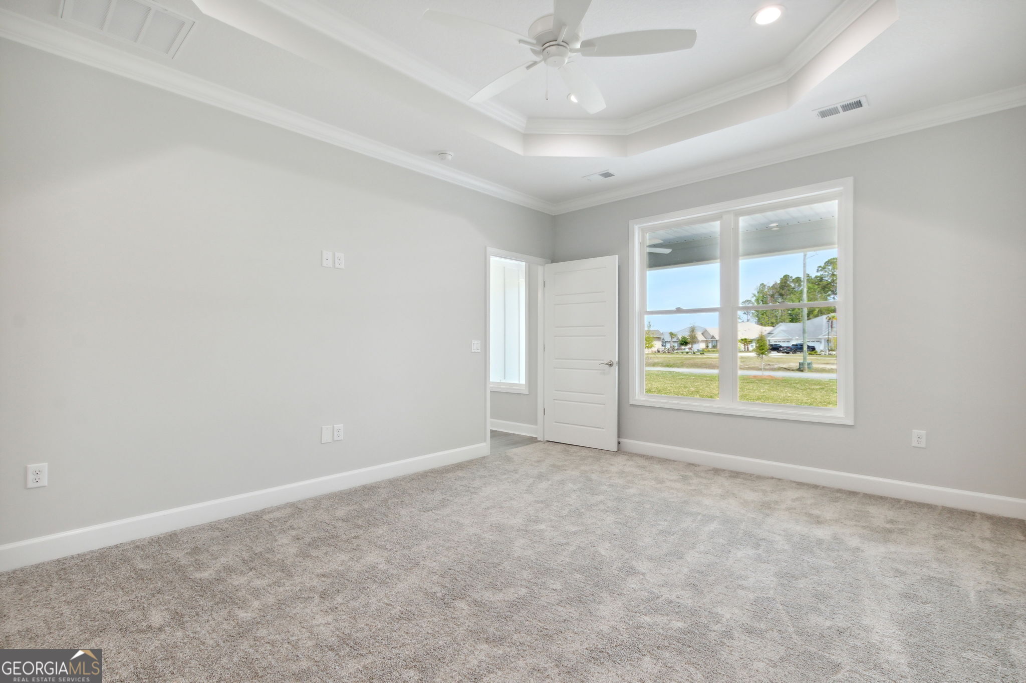 107 Green Turtle Court Kingsland, GA 31548 - Photo 21 of 39 wooden floor in an empty room with a window