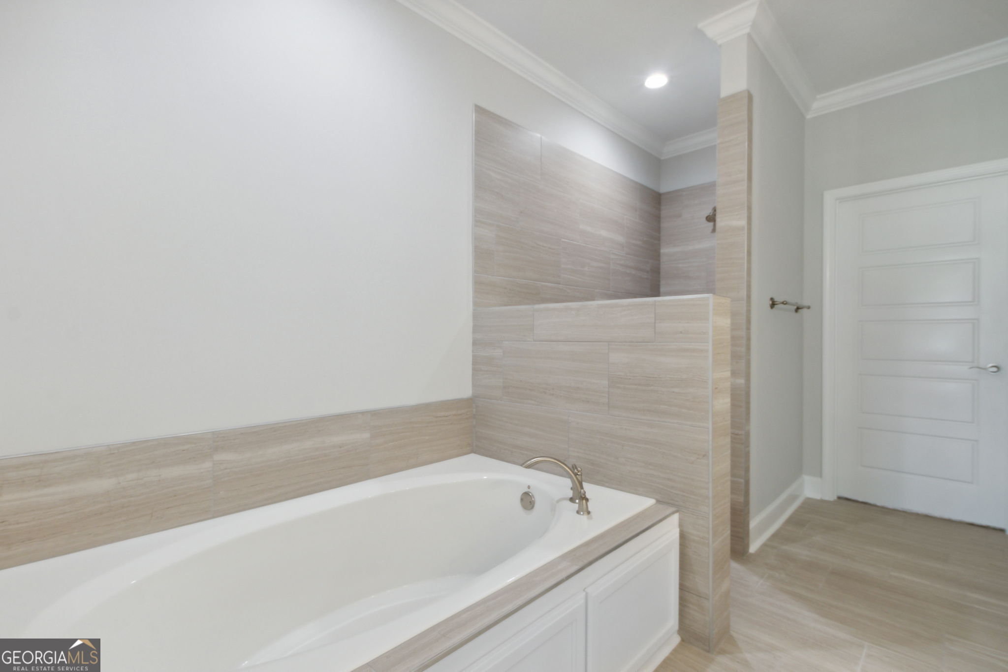 107 Green Turtle Court Kingsland, GA 31548 - Photo 24 of 39 a bathroom with a tub shower and vanity