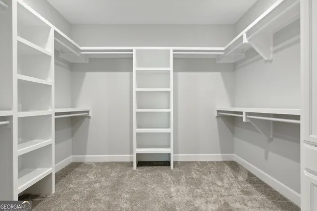 a view of an empty walk in closet