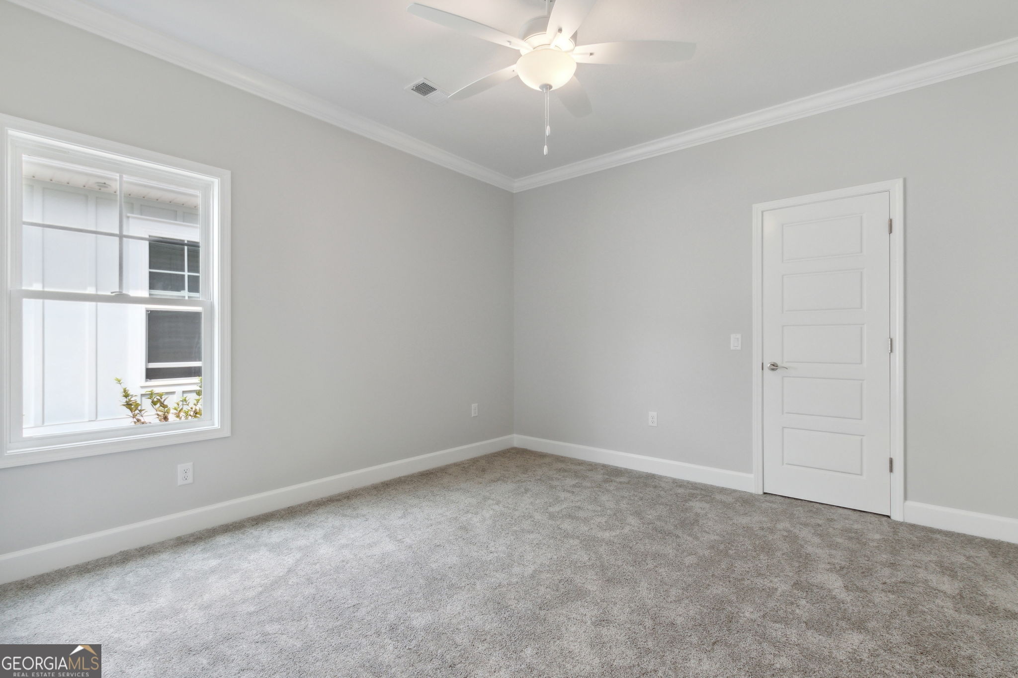 107 Green Turtle Court Kingsland, GA 31548 - Photo 29 of 39 an empty room with a window