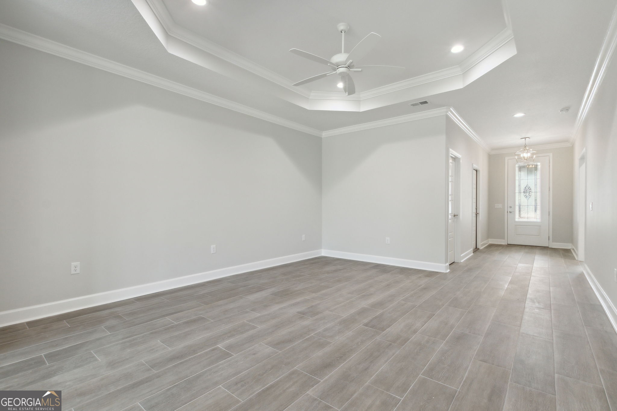 107 Green Turtle Court Kingsland, GA 31548 - Photo 7 of 39 a view of an empty room with wooden floor