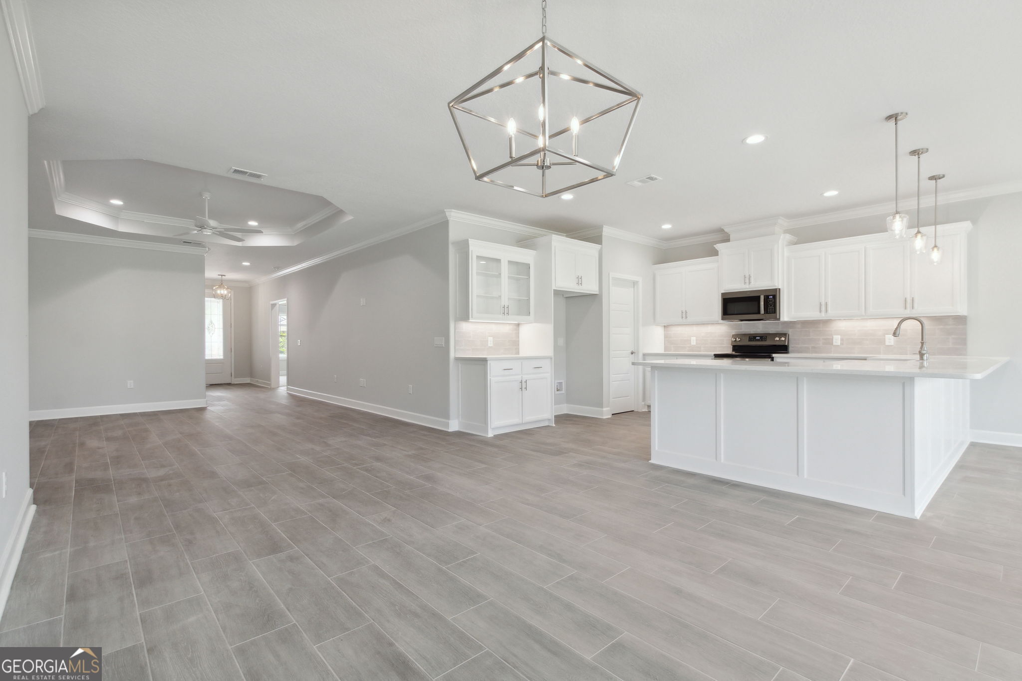 107 Green Turtle Court Kingsland, GA 31548 - Photo 10 of 39 a view of a kitchen with a sink stainless steel appliances and cabinets