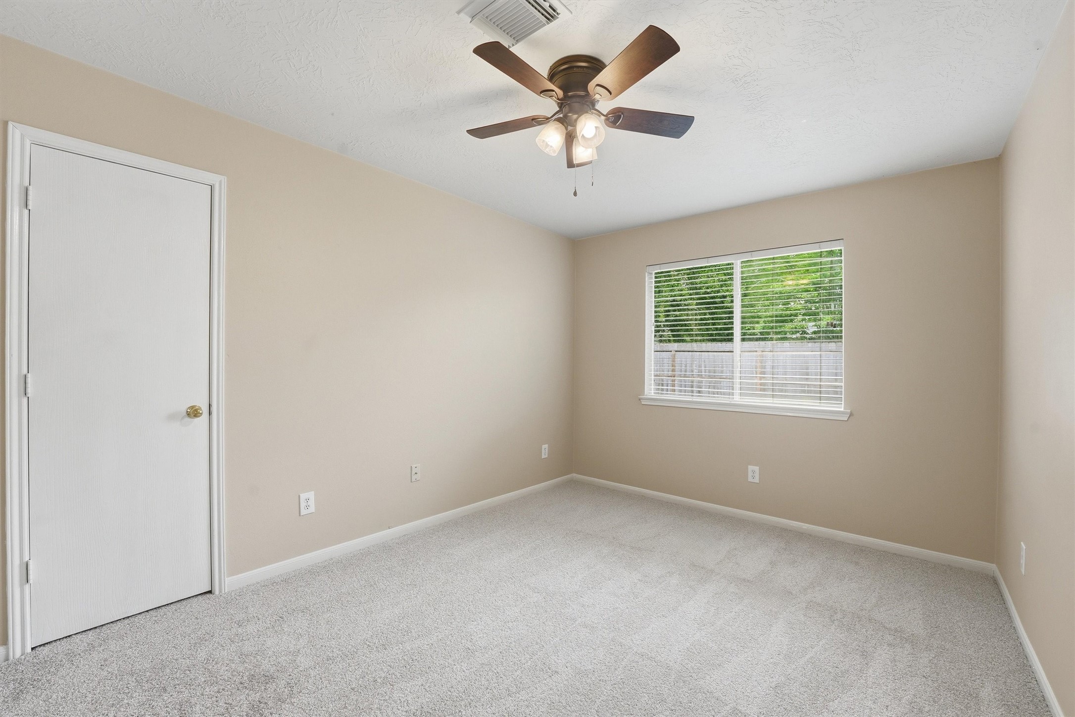 21543 Forest Colony Drive Porter, TX 77365 - Photo 18 of 32 Primary bedroom set on the other side of the house down the hall from the other 3.