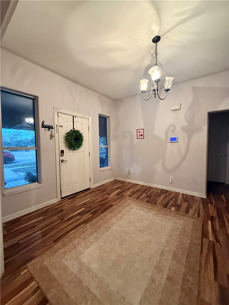 420 East 4th Street Alice, TX 78332 - Photo 17 of 28 a view of a livingroom with wooden floor