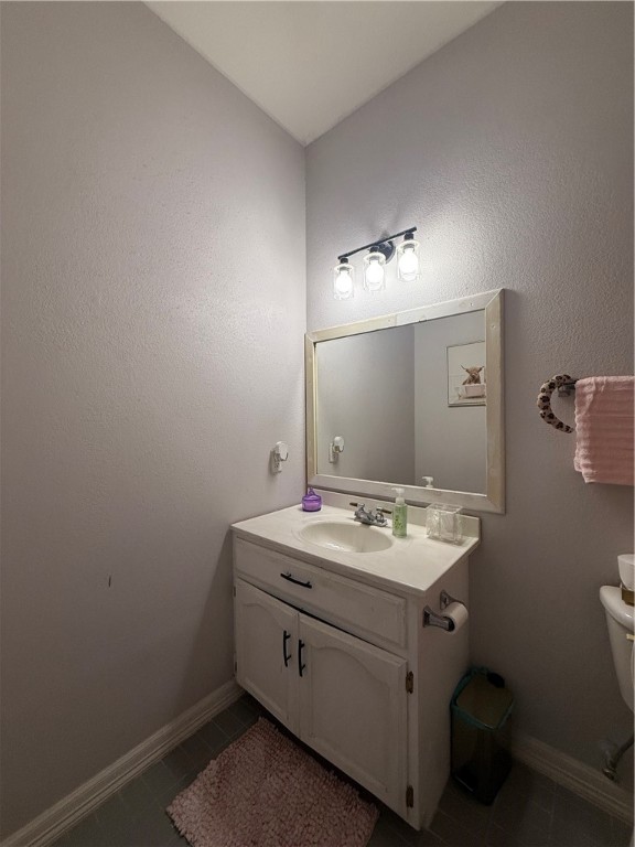 420 East 4th Street Alice, TX 78332 - Photo 27 of 28 a bathroom with a sink and a mirror