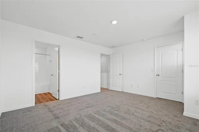 a view of a room that has a window in it