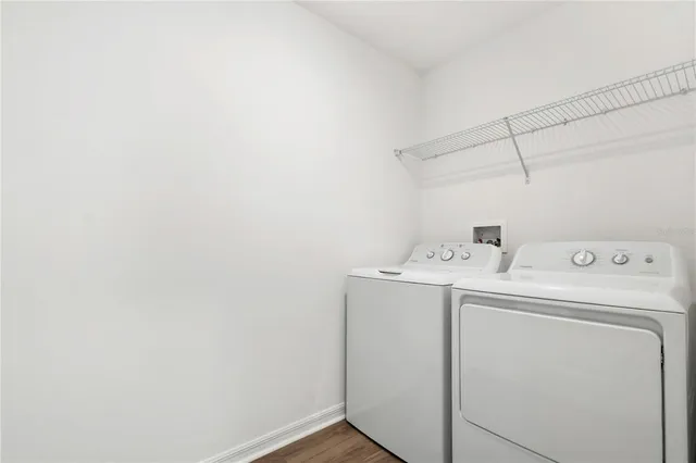 a utility room with dryer and washer