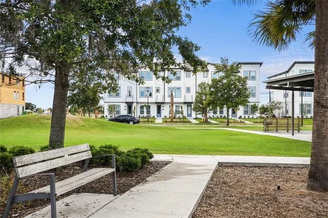 a view of a lobby with a garden and plants