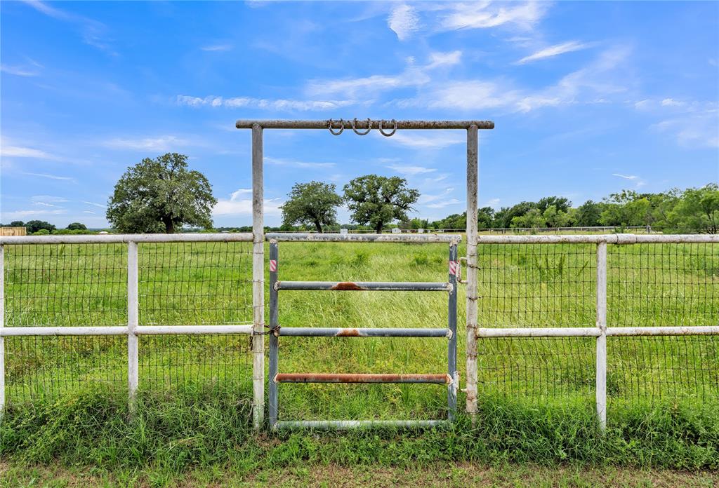 209 Dixie Road Millsap, TX 76066 - Photo 2 of 31 a view of a field