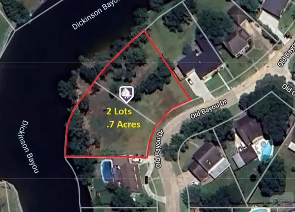 an aerial view of a house outdoor space and a kitchen