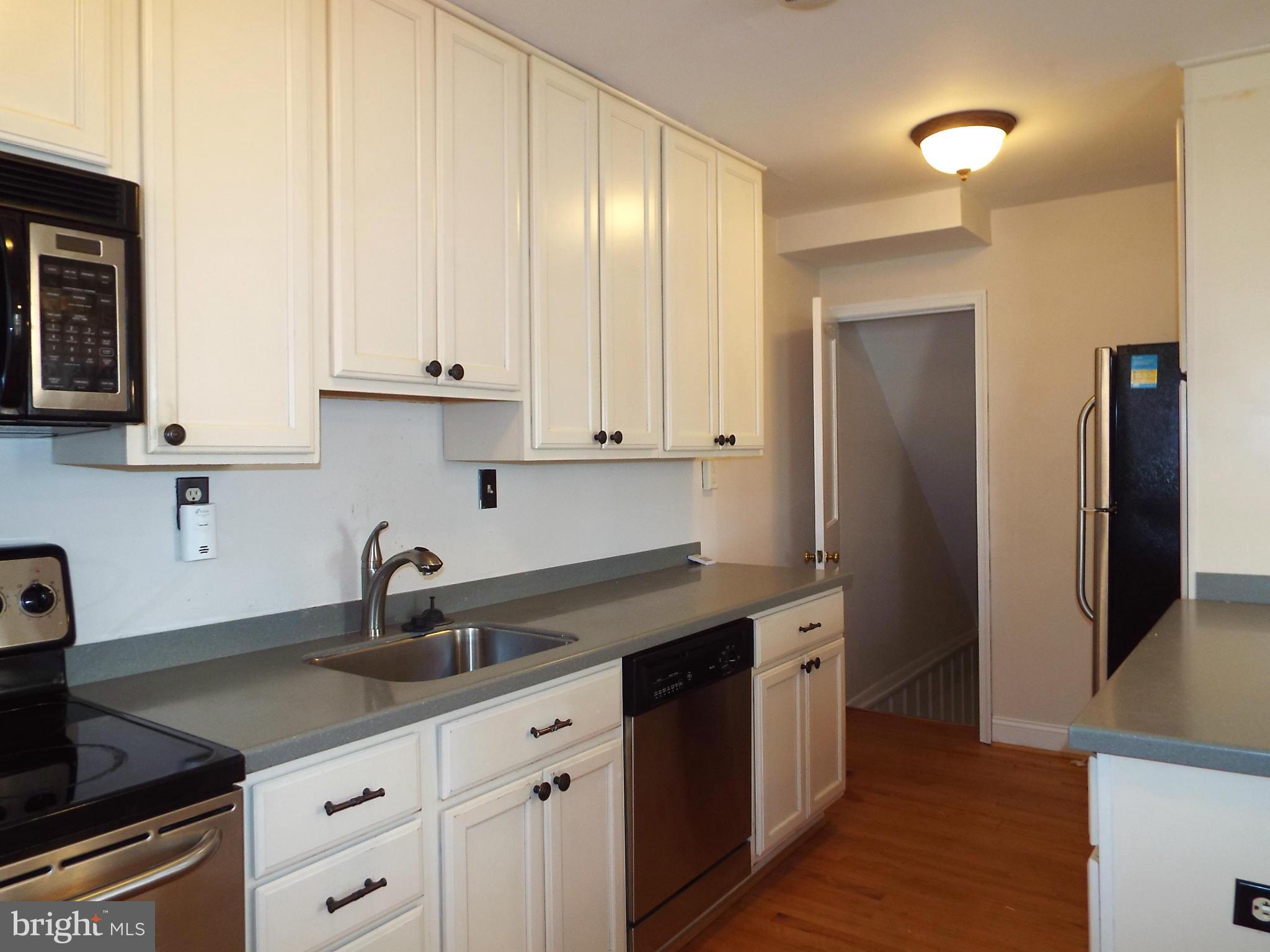1634 Hardwick Road Baltimore, MD 21286 - Photo 10 of 24 KITCHEN W/ UPDATED CABINETS AND APPLIANCES
