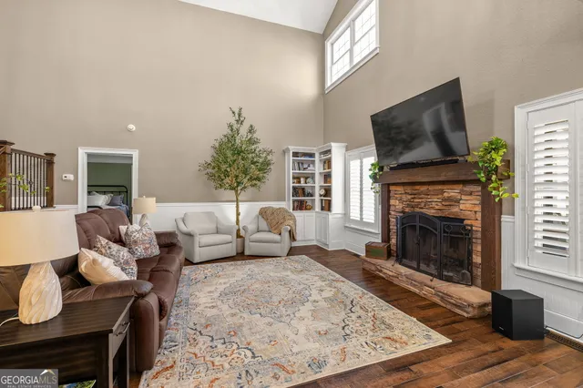 a bedroom with double bed and a window