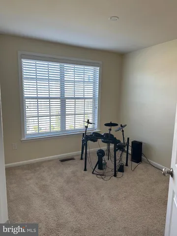 a view of a room with windows