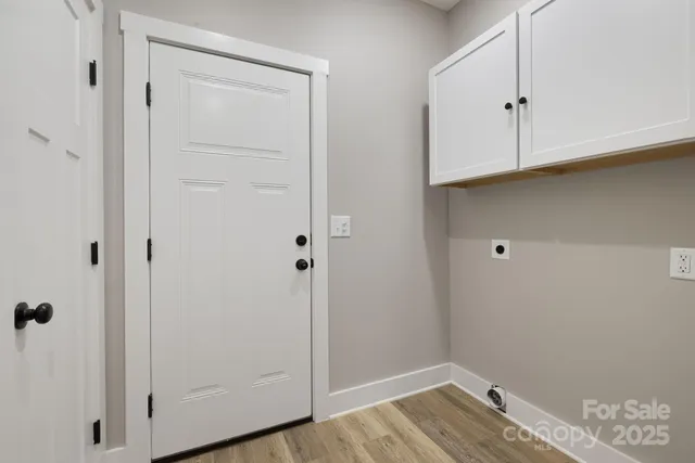 a view of small space with wooden floor