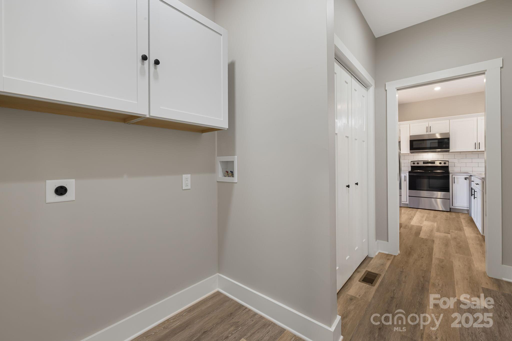 129 Brentwood Road Morganton, NC 28655 - Photo 21 of 28 a view of a kitchen from the hallway