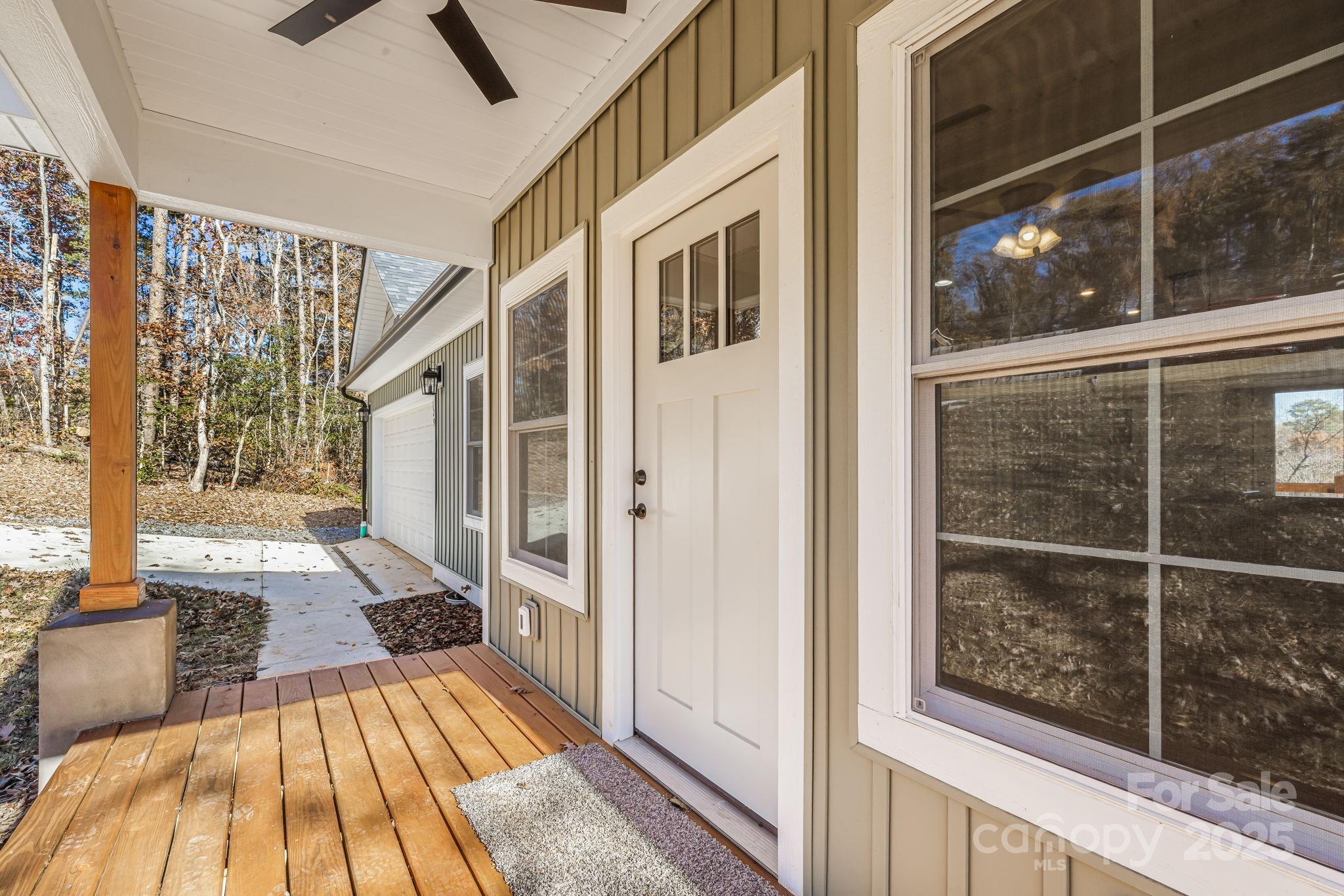 129 Brentwood Road Morganton, NC 28655 - Photo 3 of 28 a view of front door deck and living room