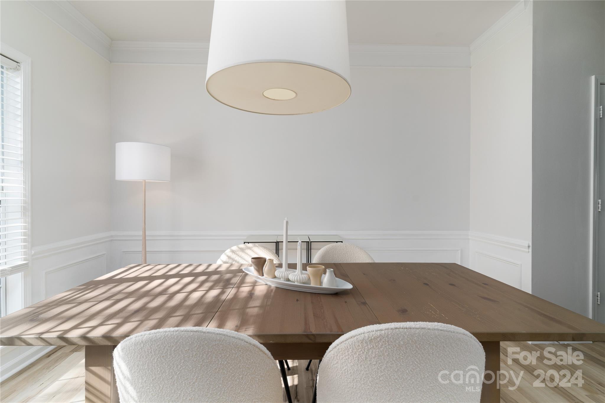 9427 Culcairn Road Huntersville, NC 28078 - Photo 11 of 39 a dining room with table and chairs