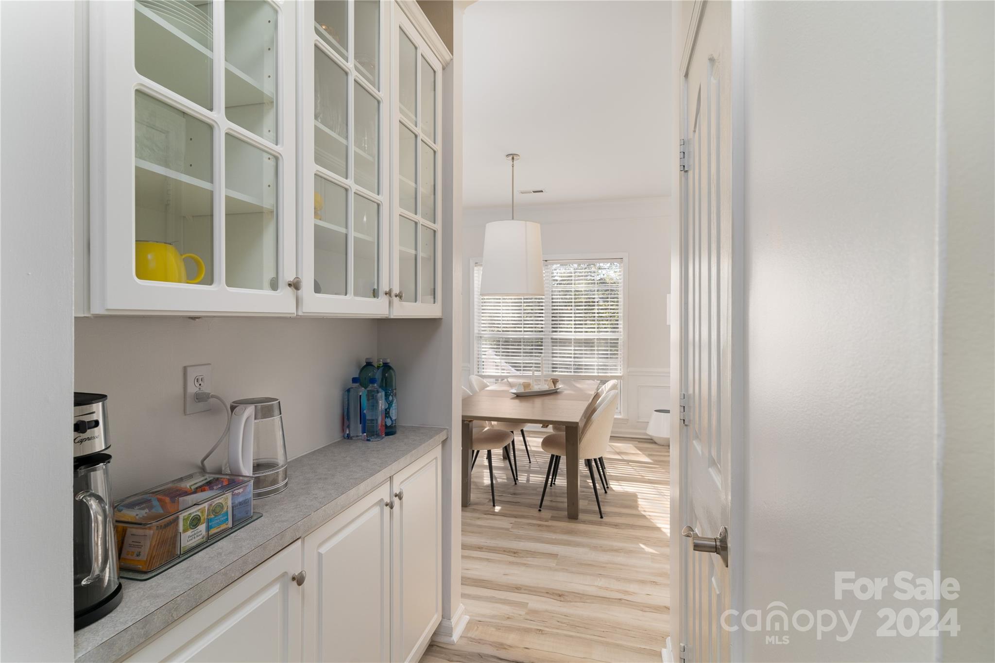 9427 Culcairn Road Huntersville, NC 28078 - Photo 12 of 39 a kitchen with a sink and cabinets