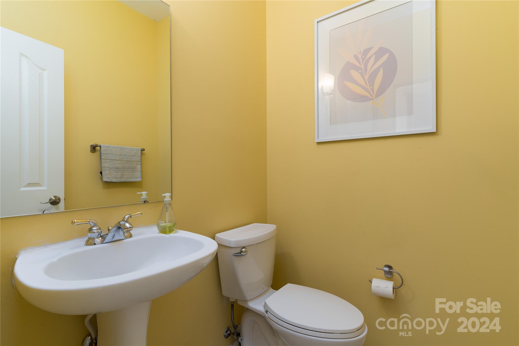 9427 Culcairn Road Huntersville, NC 28078 - Photo 19 of 39 a bathroom with a sink and a toilet