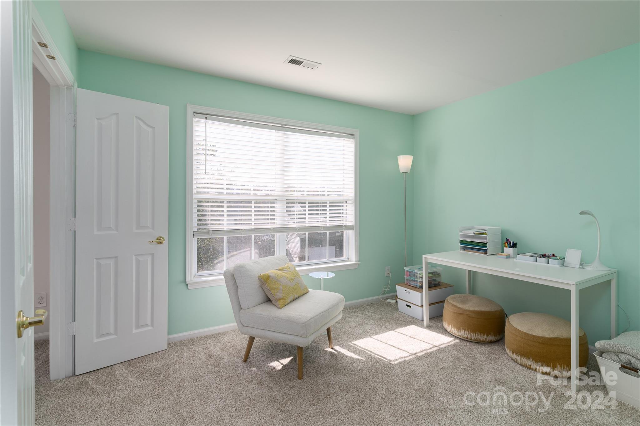 9427 Culcairn Road Huntersville, NC 28078 - Photo 25 of 39 a living room with furniture and a window