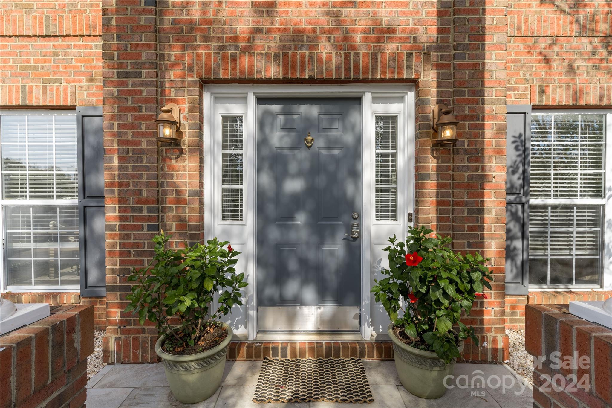 9427 Culcairn Road Huntersville, NC 28078 - Photo 5 of 39 a front view of a house with outdoor seating