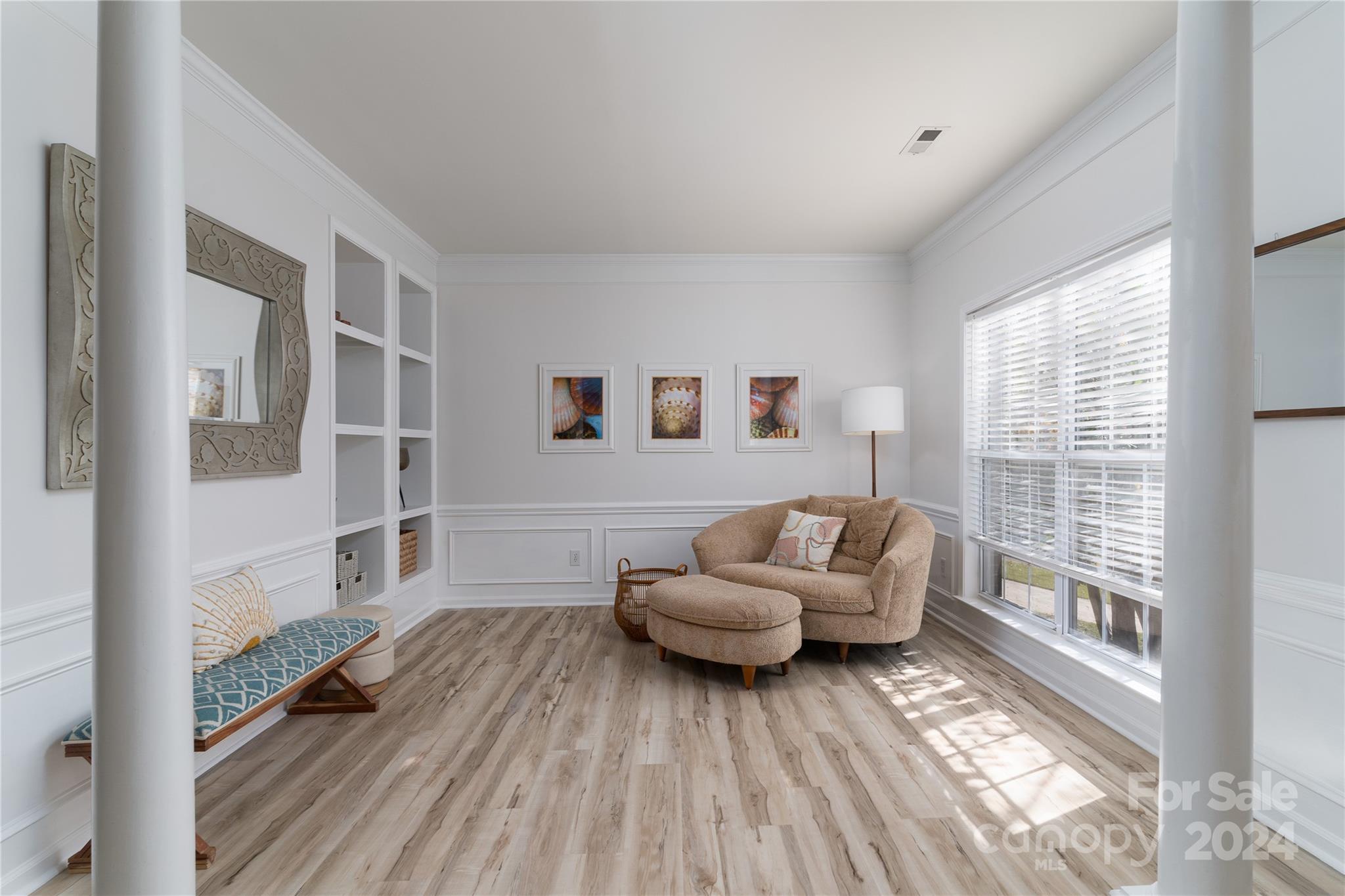 9427 Culcairn Road Huntersville, NC 28078 - Photo 8 of 39 a living room with furniture and a large window