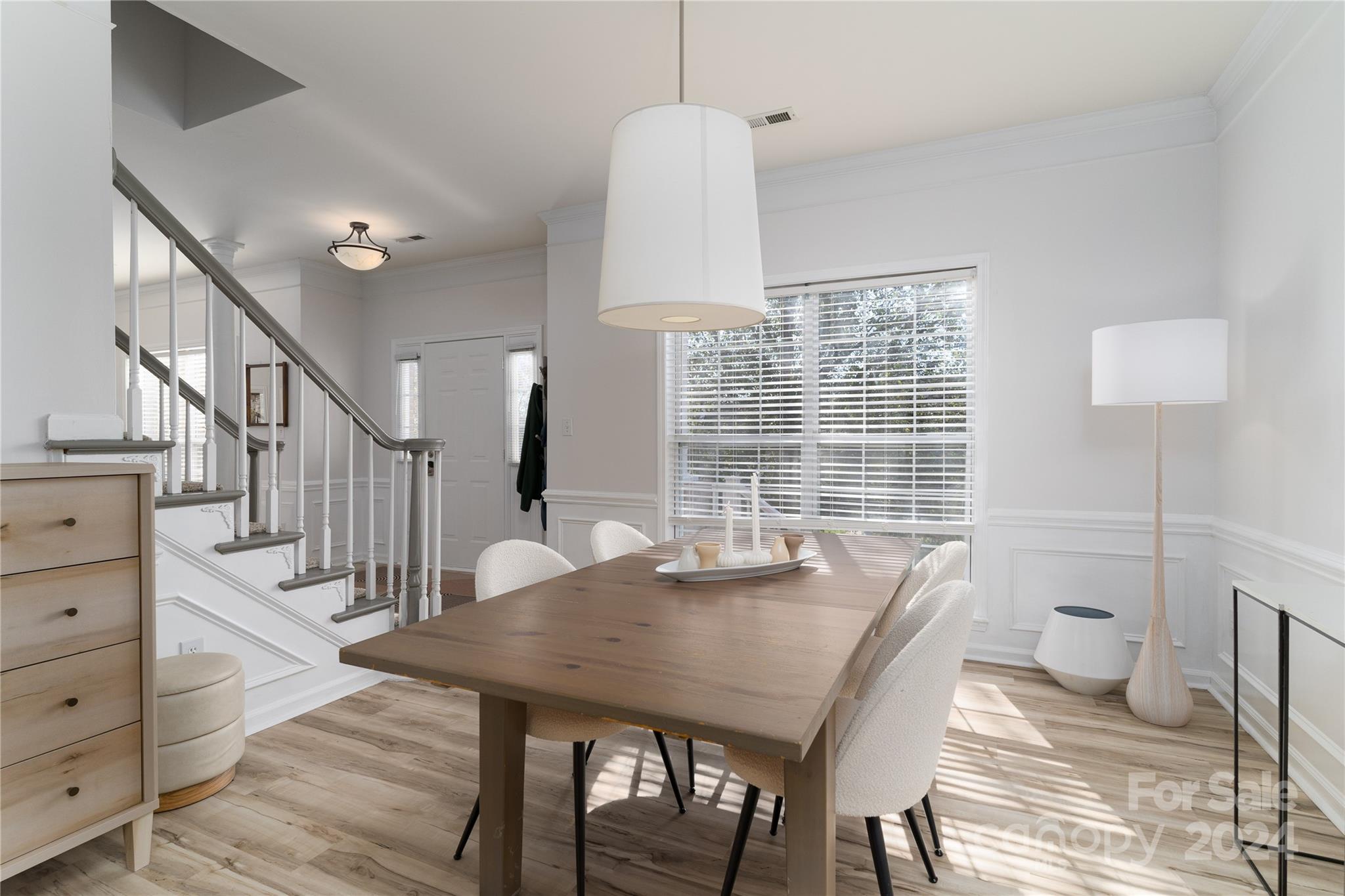 9427 Culcairn Road Huntersville, NC 28078 - Photo 9 of 39 a view of a dining room with furniture