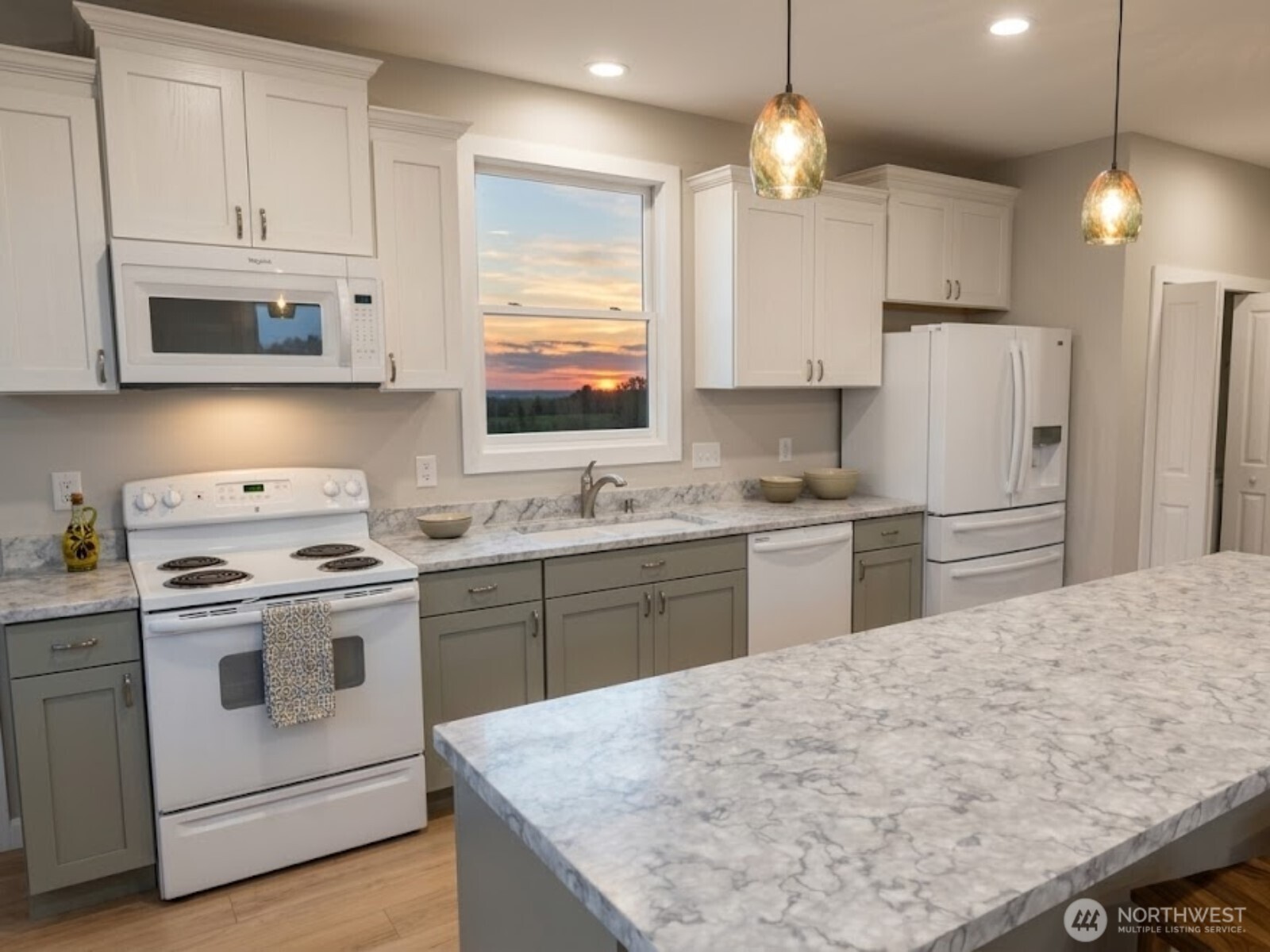 1 Endor Heights Vader, WA 98593 - Photo 5 of 16 a kitchen with granite countertop a sink stainless steel appliances and white cabinets